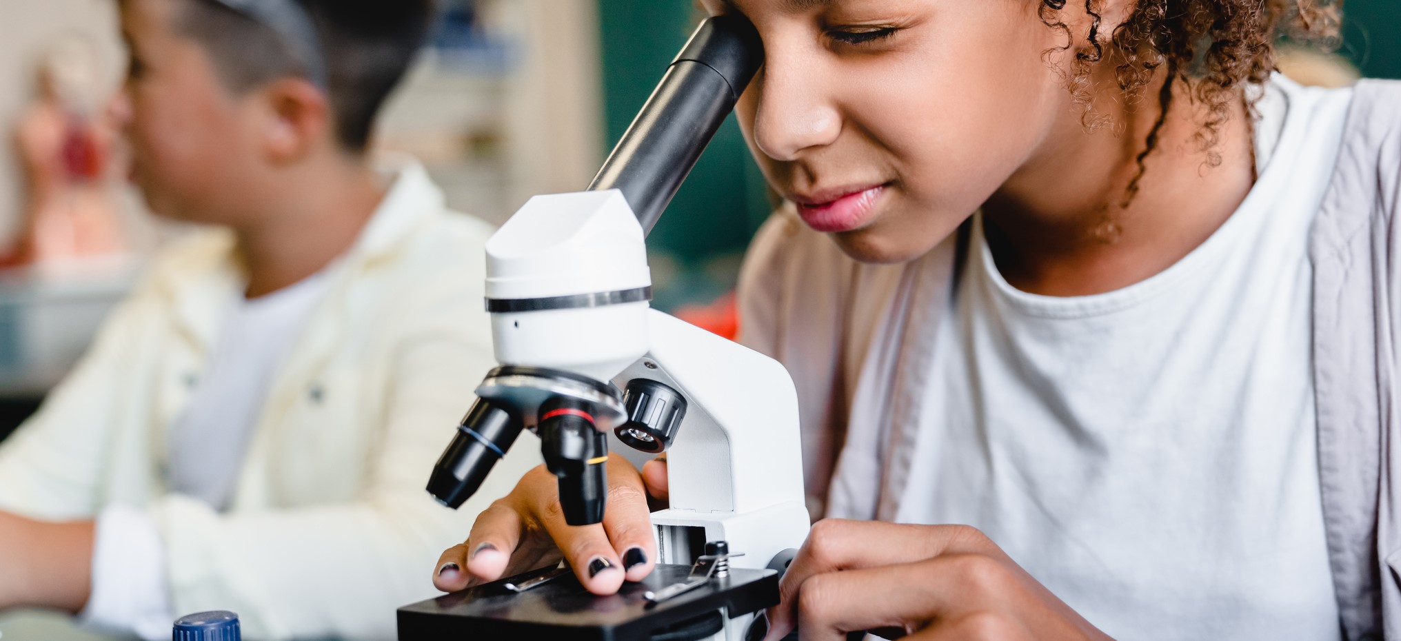 Student with microscope